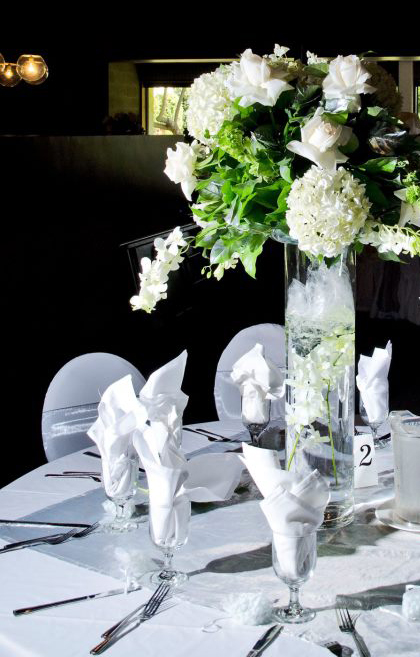 white bouquet beautiful table setting
